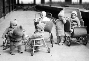 babies in chair-walkers and prams