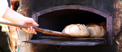 Loaves, metal oven, baker's peel
