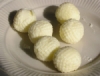 Small balls of butter with grooved surface