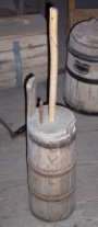 Wooden upright plunge or dash churn with dasher staff and lid